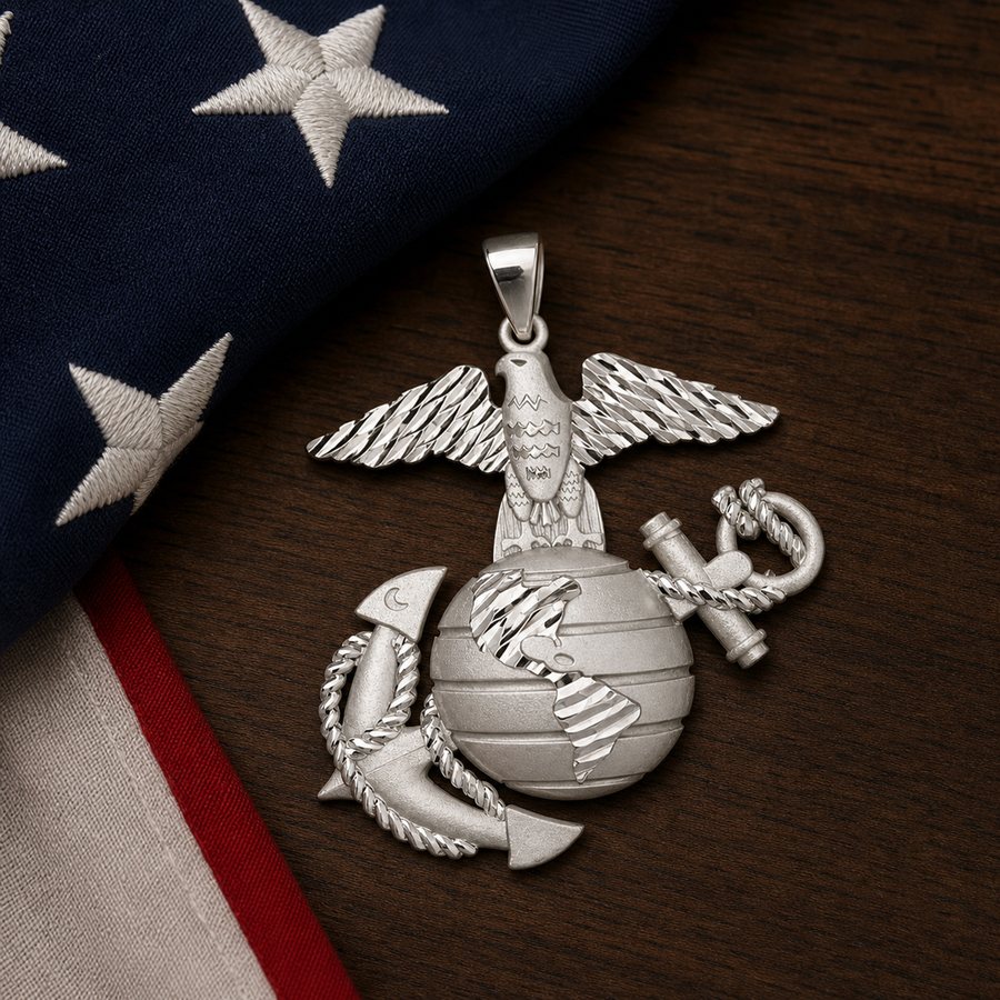 Sterling silver Marine Corps Eagle, Globe and Anchor pendant on an American flag