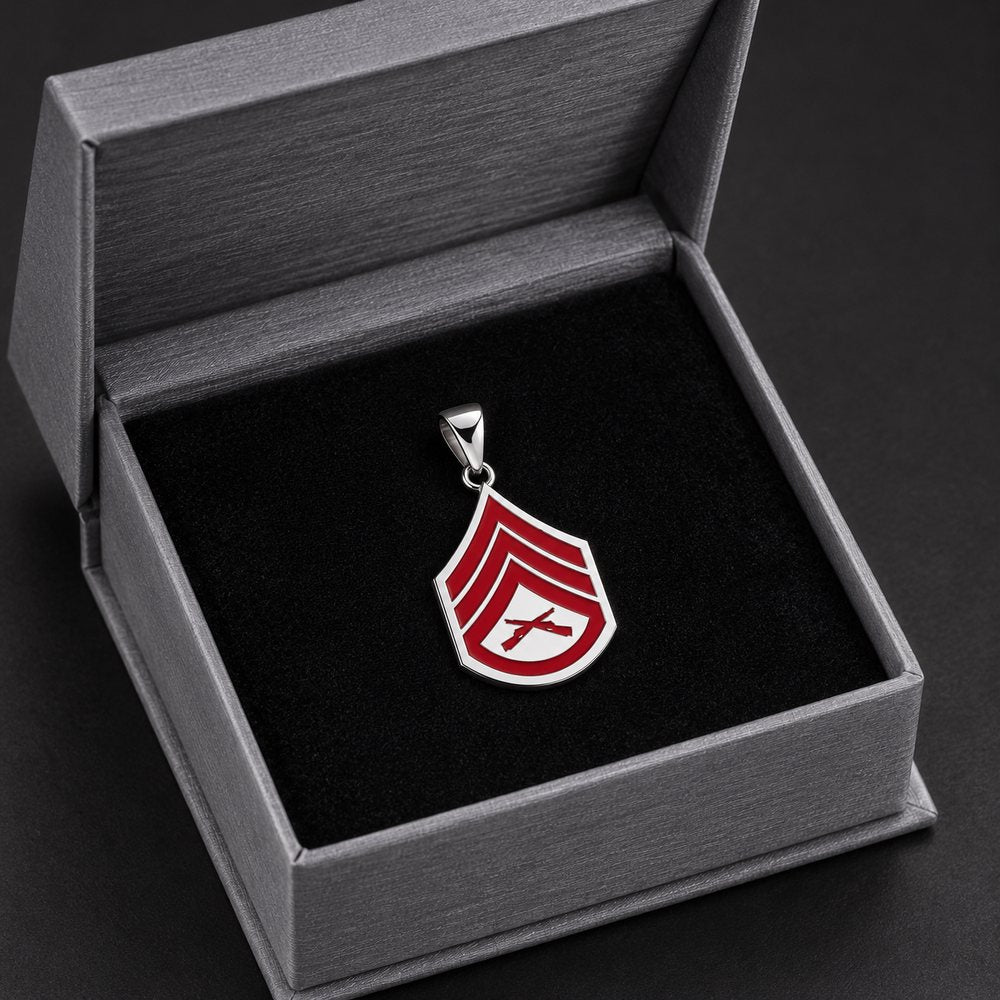 Rank pendant resting in an open gray presentation box